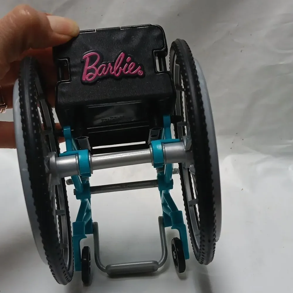 Mattel 2018 Barbie Rolling Aqua Blue Wheelchair